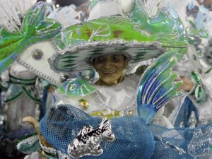 A reveller from the Imperatriz samba school parades on the first night of the annual Carnival parade in Rio de Janeiro's Sambadrome