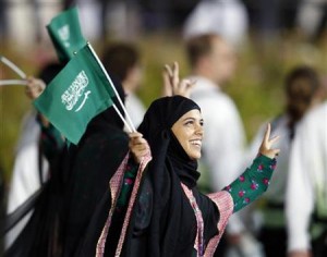 Saudi Arabia's contingent takes part in the athletes parade during the opening ceremony of the London 2012 Olympic Games at the Olympic Stadium